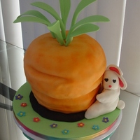 Every Bunny's Dream Carved from two 8", a 7", and a 9". Coconut cake with lime cream cheese frosting.Inspired by merciermom's cake.