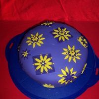 First Fondant Cake This was my first time working with fondant - actually it was my first cake period. I saw every flaw, but my family loved it