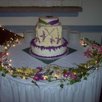 Mosaic Cake Cake has hand painted mosaic--its painted with luster dust on white chocolate. Top was a mobius stip (per couple's request).Bottom was...