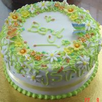 Mother-In-Laws 70Th B/day Had great fun with this cake. Inspiration from Thanh Thanh on this site. Thanks. Love the colours. Stuck with spring green, yellow and...