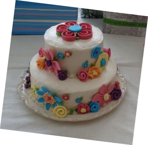 50Th Birthday Flowers White cake with buttercream and fondant flowers. I designed the flowers to match the party napkins and plates. I have never had such...