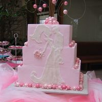 Pink Silhouette The silhouette was piped in royal on the flush back of the square cakes. All the baubles are fondant or pearls shimmered up with lots of...
