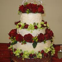 Casey's Wedding 6-9-12" Rounds. Cream Cheese Buttercream icing over Dark Chocolate Almond cake filled with Chocolate Hazelnut Mousse. I'm...