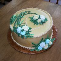 Heather's 2009 B'day Freach Vanilla with lemon filling; 10 inch round torted.