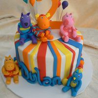 Backyardigans iced in buttercream with lots of fondant accents. Backyardigans made from fondant and gumpaste.