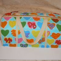 Dooney And Burke Buttercream with fondant accents. Made to match the birthday girls bag she was getting for her 13th birthday!!