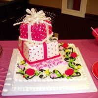 Gifts For The Bride sheet cake w/floral design, then two gift box cakes stacked one done with mmf and one w/ rolled buttercream. colors: hot pink and white