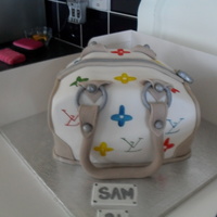 Handbag I made this cake into a handbag for my future daughter in-laws sister, for her 21st..she loves ....but dosnt want to eat it.
