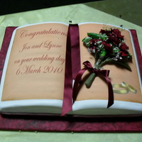 Book Wedding Cake I recently made this cake for my brother in laws wedding. His wife wanted somthing different. They where very please with it. The flowers...