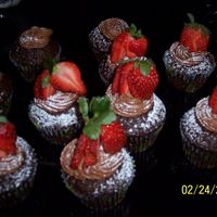 Chocolate Cupcakes With Chocolate Bc & Fresh Strawberries Chocolate Cupcakes made with leftover batter / icing I had from another cake I was doing. They are filled with strawberry cream filling and...