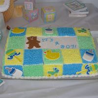 Boy Baby Shower This was for my cousin's baby shower. The cake is marble cake with milk chocolate frosting filling, buttercream, and color flow...