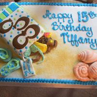 Beachy Birthday Cake Buttercream frosting with MMF accents. first attempt with the MMF. but the Birthday Girl loved it and that is all that counts.