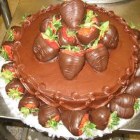 Grooms Delight This is a 12" cake.. so imagine the size of those berries. They were easily 3" across on some of them! (Yay Florida)