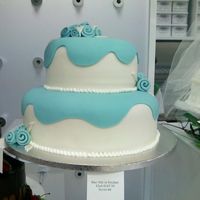 "blue Steel" Fondant Dummy Cake.. I saw a picture of a simaler cake in a wedding magazine one of my friends gave me, so when I had to do a dummy cake...