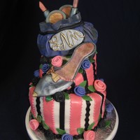 Makeup And A Shoe I made this cake for my little sis who is now 29. This is my first attempt to do a shoe, I need more practice. The cake is covered in MMF....