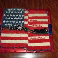 Happy Birthday America This was two 9x13 cakes "overlapped" to make a 3-D wave of the flag. It also served as a belated birthday cake for two motorcycle...