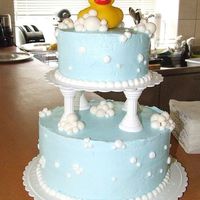 Rubber Duck Baby Shower Cake This was for my friend's baby shower. I used fondant for the "bubbles" and B/C frosting for the beaded border. Chocolate...