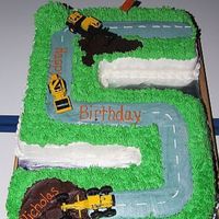 Tonka Construction Cake This was for my son's 5th birthday. I compiled a few different ideas from other contributor's on this site to put this one...