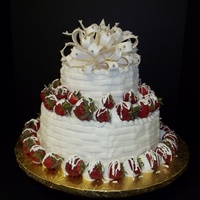 Strawberries And Cream 10in/6in Red Velvet Cream Cheese filling Buttercream with Basketweave design. Gumpaste bow