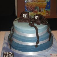 Barmitzvah Cake 14",12",10" chocolate cake, chocolate ganache filling and chocolate buttercream. Fondant with buttercream accents and satin...