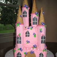 Princess Castle For my daughter's first birthday! White cake, frosted in BC, door and windows are fondant. This was my first attempt at a castle cake...