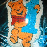 Winnie Pooh I bake this cake for my son first birthday ,it is buttercream icing.