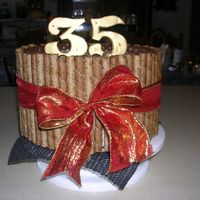 35Th Birthday Cake This was my brother in-laws birthday cake. 2-layer chocolate cake with chocolate pudding filling. Covered in icing and decorated with...