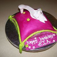 Pillow/ Shoe Cake First time at both. Chocolate cake with fudge frosting filling. Loved this cake so much. For my neices 11th birthday party. Accompanied by...