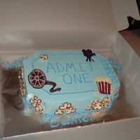Movie Ticket My friend was hosting a movie party for her son's birthday and we came up with this idea for a cake. Cake is covered in buttercream...