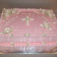 Madeline's First Communion Madeline requested a pink cake with white flowers and a cross. These were my first roses--everything made out of IMBC.