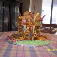 Bushel Of Cookies I made this for someone who loves cookies. All the cookies are homemade and the "bushel" is chocolate cake. The cake is iced in...