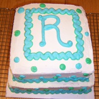 Baby Shower Two tiered yellow cake with BC icing.