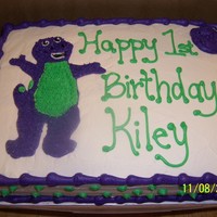 Barney Cake Yellow cake with BC icing. Matching smash cake as well. TFL.