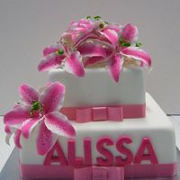 Lily Squares 6 and 9 inch squares , iced in fondant , bought lily , I painted , chocolate mud ,