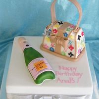 Bag And Champers cast of champers bottle (no cake) 3d small bag cut from 7 inch squaresitting on 15 inch squaremud cakes