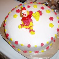 Clown Cake My first figure piping/clown cake. I think it turned out cute. Any suggestions?