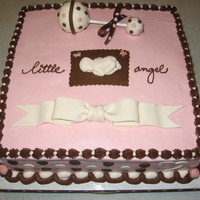 Pink & Brown Baby Shower Cake Baby is made with First Impressions mold with fondant (& tylose) . Rattle is styrofoam ball covered in fondant. MMF dots/hearts on...