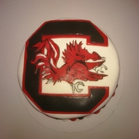 Gamecocks Logo Cake Gamecocks logo cake, model clay dog incl. wearing Gamecocks jersey. The lady that ordered loves Gamecocks and wanted a keepsake of her...