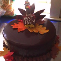 Turkey Cake I made this for my daycare class for our Thanksgiving feast. The kids and parents loved it. The turkey and leaves are made out of modeling...