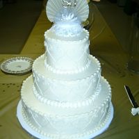 50Th Anniversary This was my first wedding style cake. I was so nervous when delivering and setting up for this cake. I was happy with the finished product...