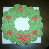 Mini Cupcake Wreath First cupcake cake. Made with about 26 mini cupcakes. I wanted to make some of these for Christmas, and since I had never done anything...