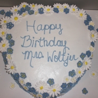 Birthday Cake For A Teacher Chocolate cake with chocolate gnache. Buttercream frosting. with royal icing flowers