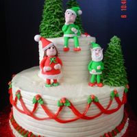 Christmas Elves Cake Here is a picture of the finished cake I made the elves for. Red Velvet Cake with Cream Cheese Filling and Icing. Gumpaste/Fondant Elves,...