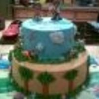 Dora And Diego Thanks to all who inspired me. This is a 8" and 10" round vanilla cake one layer vanilla with strawberry filling and the otehr...