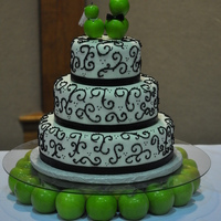 Black & White Scroll My very first wedding cake! White and Strawberry cakes covered in MMF, MMF ribbon and royal icing scrollwork. The family picked up the cake...