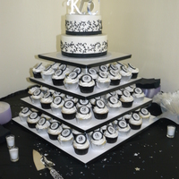 Black And White Butter cream cupcakes with stamped fondant initials on top