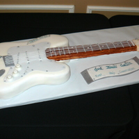 Jesus Rocks! A very out of the box theme for a 1st Communion party! Body is cake, head and neck are RKT, all fondant decorations, hand painted cross.