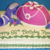 Purse & Shoe Cake Vanilla Cake, Buttercream frosting. Shoe & purse made of fondant. This was my first attempt at a shoe or purse but I was really happy...