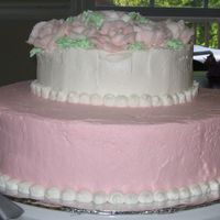 Round, Stacked Cake 10" & 6" round Spice cake with cinnamon BC frosting and decorations.