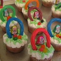 Easter Basket Cupcakes White cupcake, BC frosting, jelly beans, choc. bunny